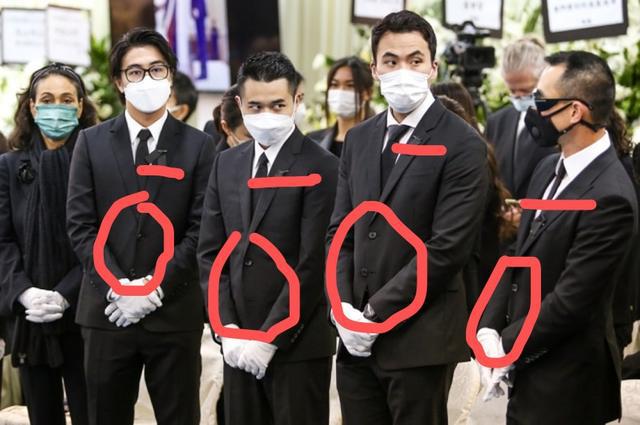 杏彩体育(中国)官方网站黑色西装配黑色衬衣西装衬衫西装扣子礼仪规范从何鸿燊葬礼学